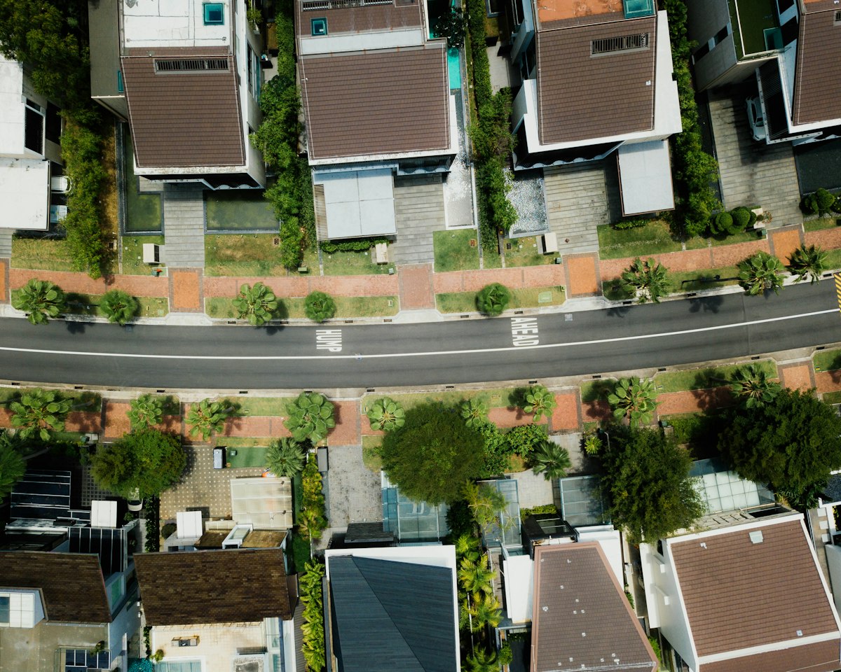 Aerial view of a residential neighbourhood with brown-roofed houses